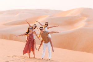 friends enjoying in desert