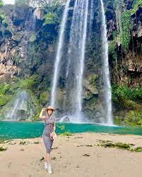 a tourist from Europe enjoying magical beauty of salalah oman