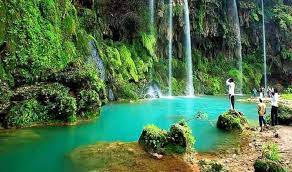 a stunning view of water falls in Salalah oman