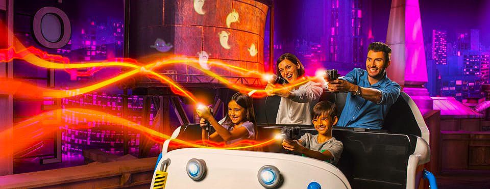 a family enjoying holding lights gun in their hands in a jeep 