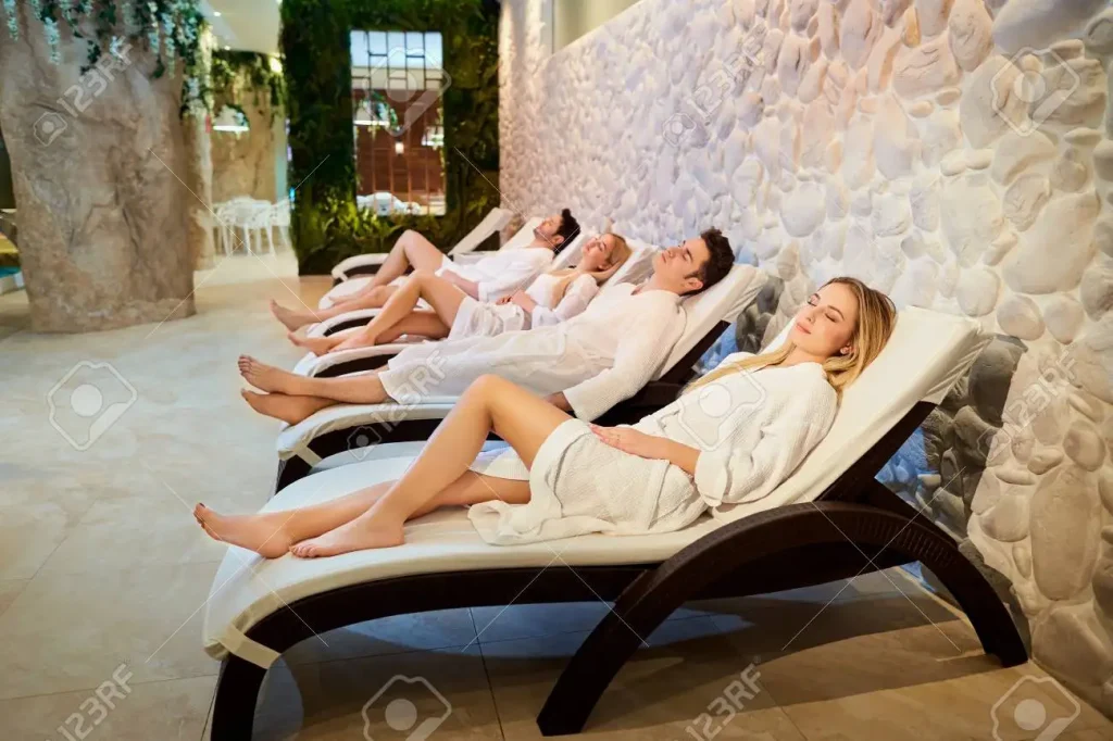 tourist in bathrobes lying spa decks are getting wellness treatmentstreatment