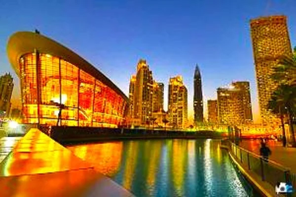 a stunning view of dubai opera theatre along with canal