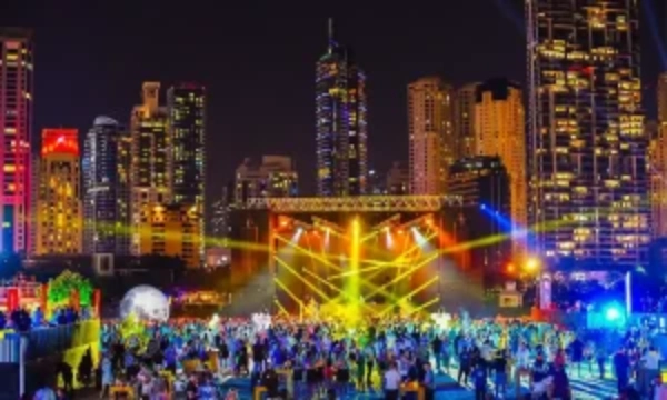 a huge crowd enjoying music and lights party